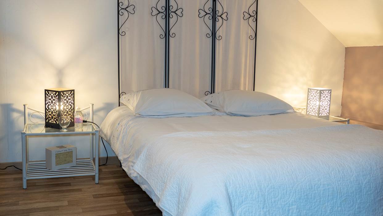 lit double chambres des parents suite familiale