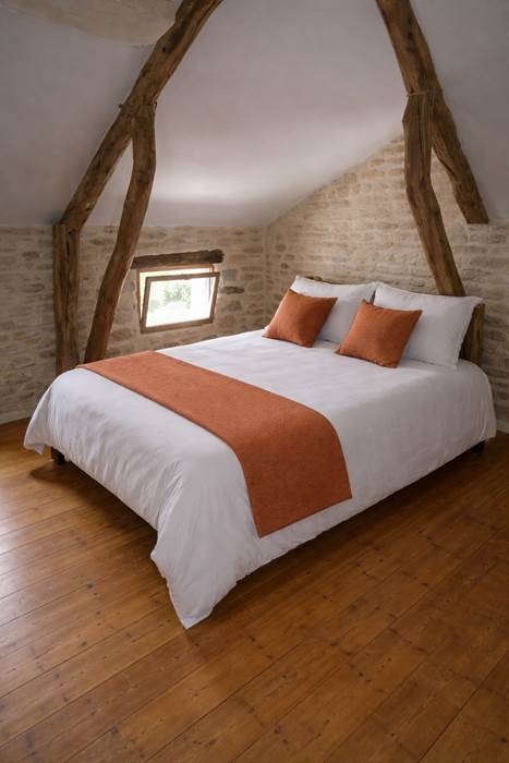 Chambre d'atelier sous les poutres