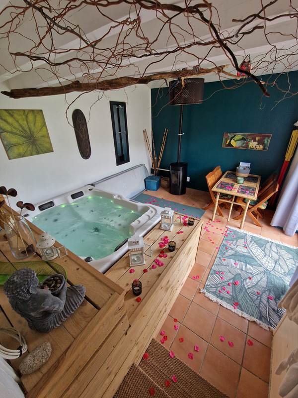 Séjour avec poêle a granulé et jacuzzi privatif-gallery