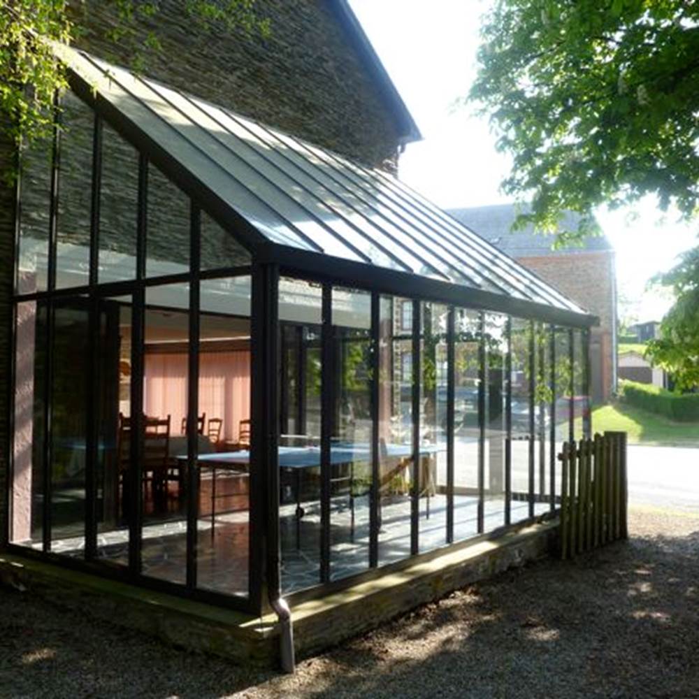 1.3.2. Rez-de-chaussée - la véranda - vue de l'extérieur-presta