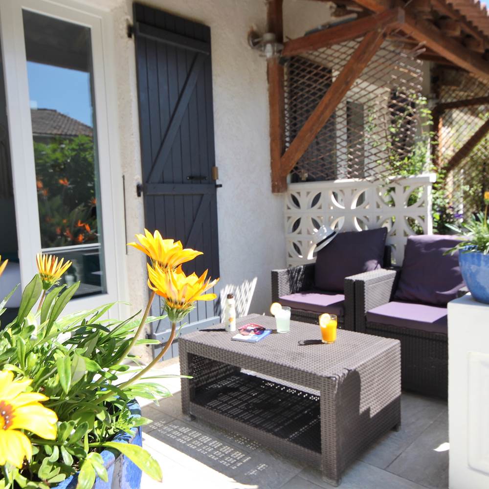 Appart Bleu Azur location Lotu ou Saleccia  terrasse coté jardin à Saint Florent en Corse-presta