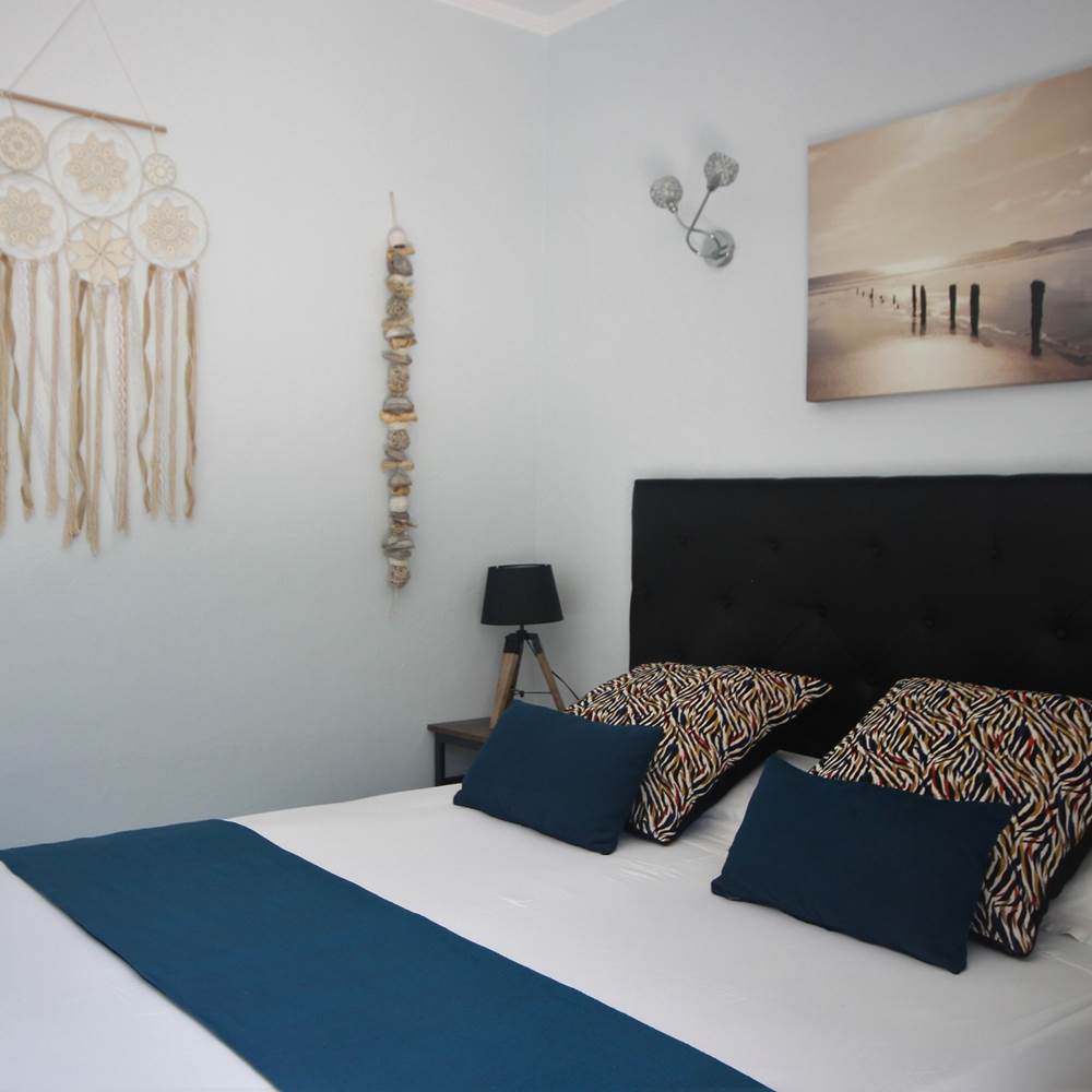 La chambre avec lit en 160 de l'appartement Lotu-presta