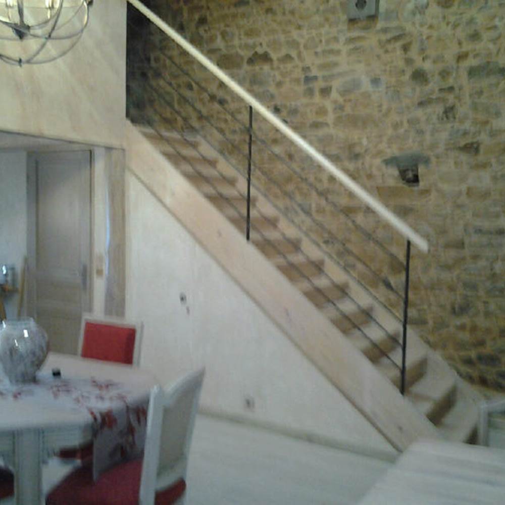 Escalier vers la chambre-galerie