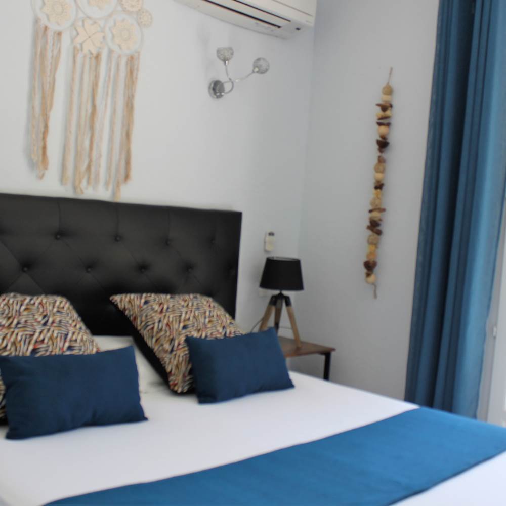 Chambre vue jardin appartement Saleccia-presta