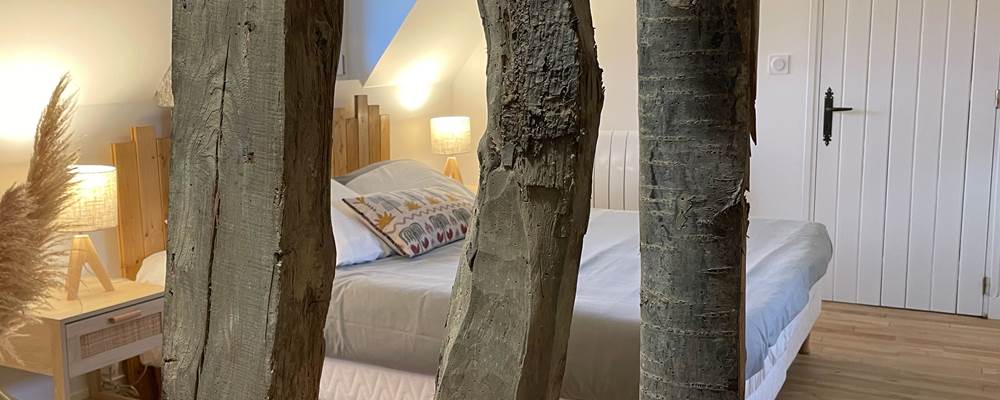 La chambre familiale 'La Grange' avec ses colombages celebre le bati ancien