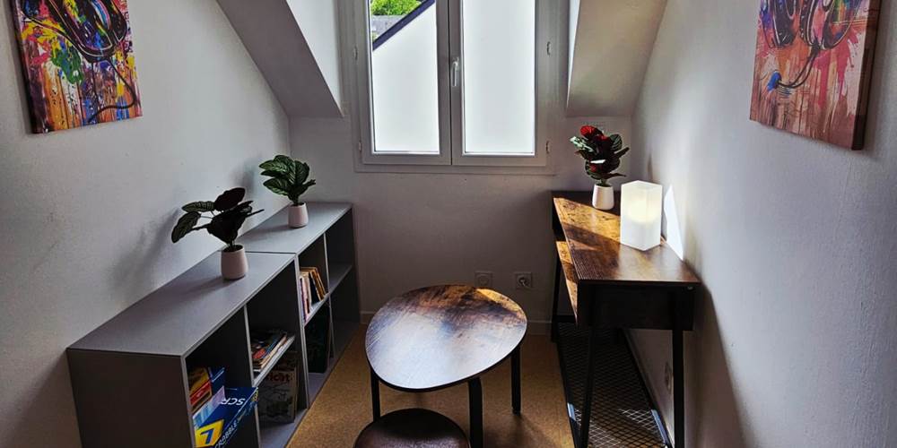 Le coin jeux-bibliothèque à l'étage