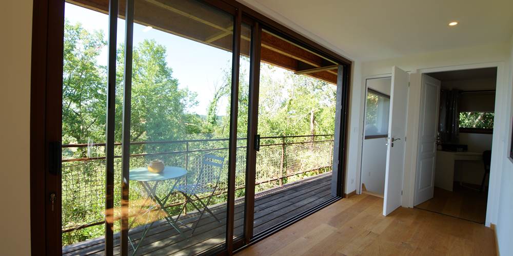 Balcon 2ème étage vue sur les arbres