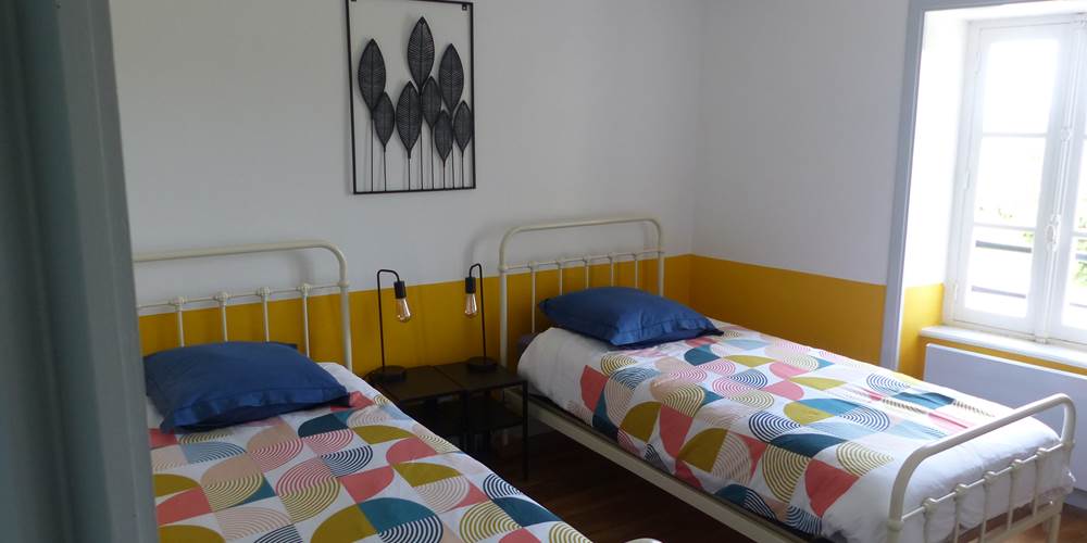 Chambre avec lit double du gîte de la Chevêche