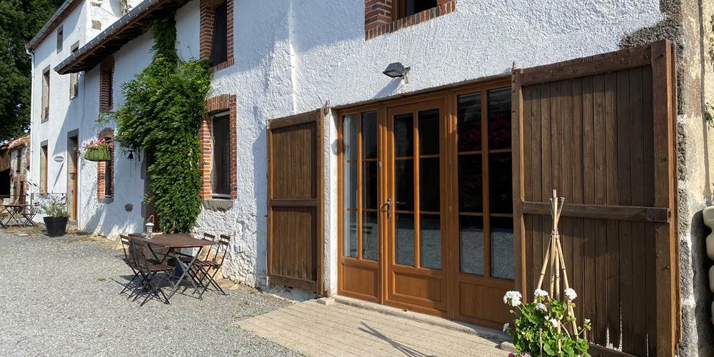 Photo de la façade sud de l'habitation - Chambres d'hôtes La Grange Richard à Dinsac