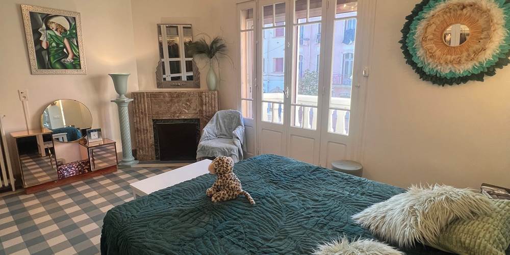 Chambre avec balcon donnant sur le jardin