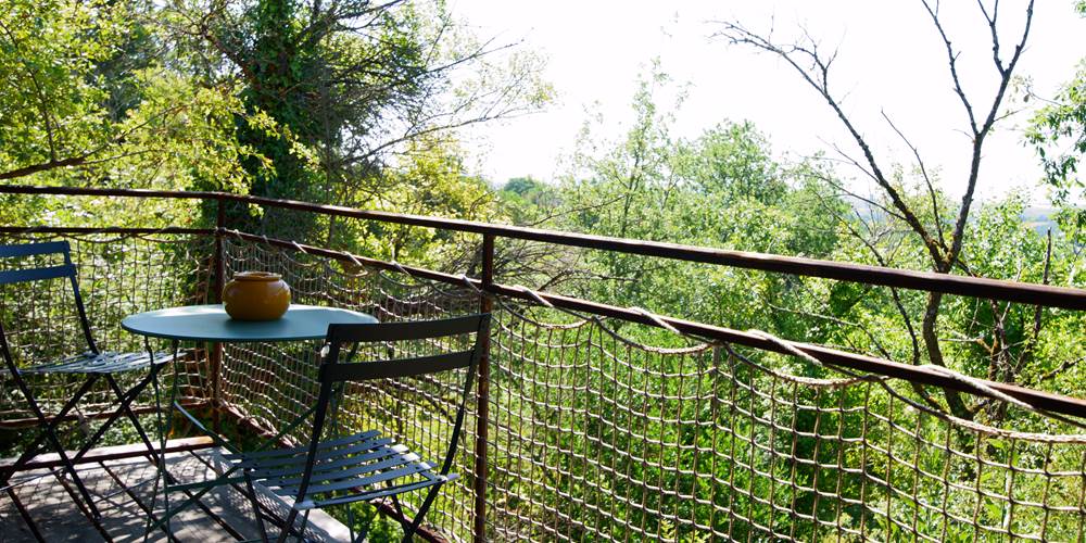Balcon vue au dessus des arbres