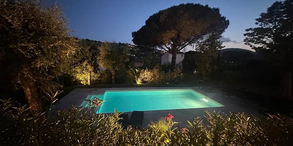 View of the mountain with pool at night