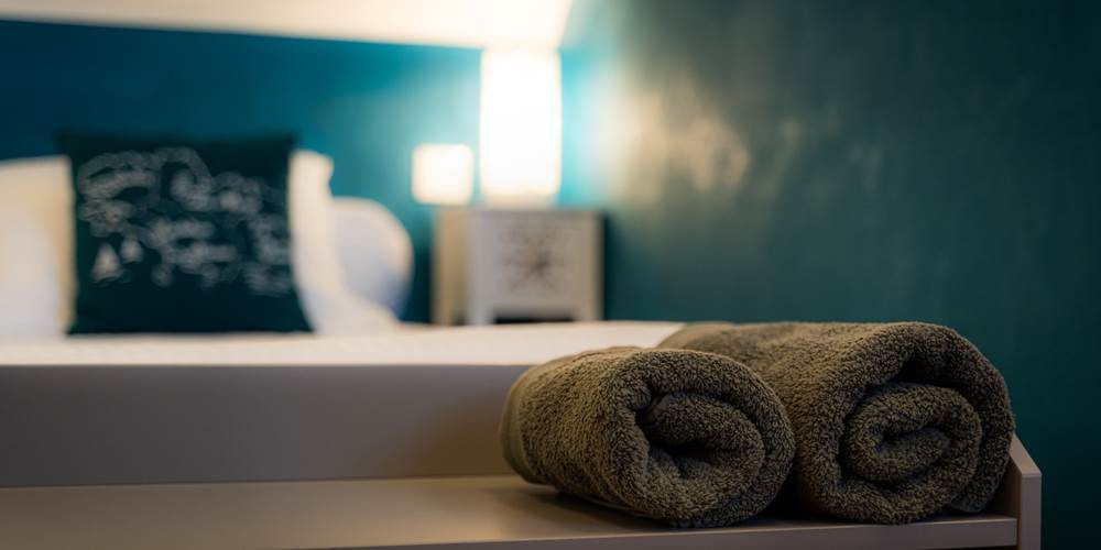 Chambre plage du Loch: le lit queen size