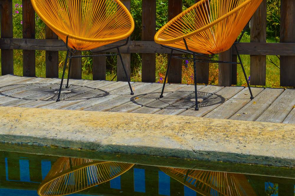 Les reflets du bassin de la Bastide du Claus