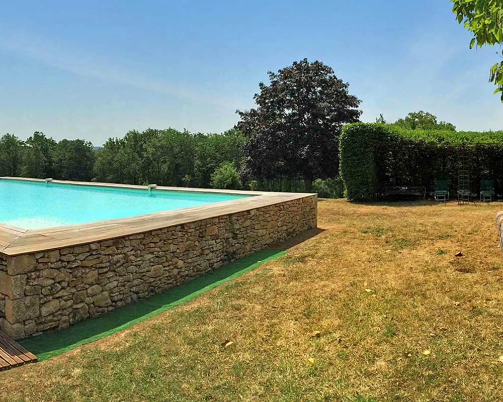Piscine 7 X 12m, à sel et à débordement
