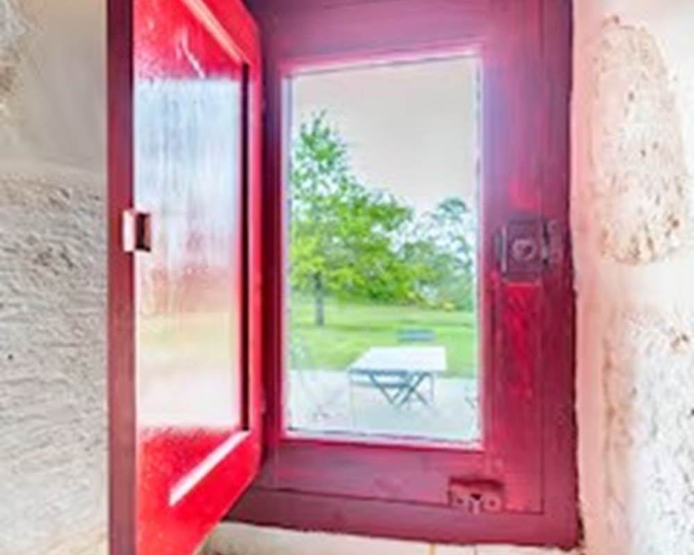 Vue sur la prairie depuis la salle de douche