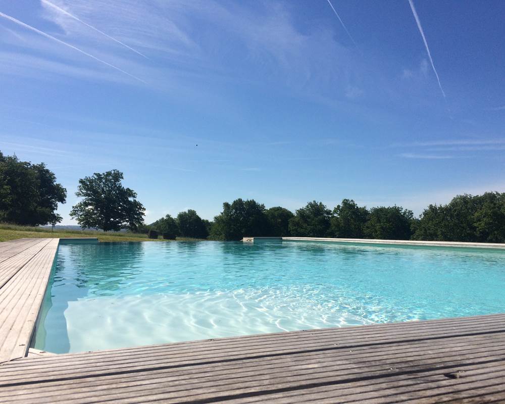 Piscine 7 X 12m, à sel et à débordement