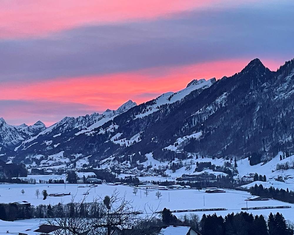 coucher-de-soleil-hiver-payage-neige-Gruyere-Suisse