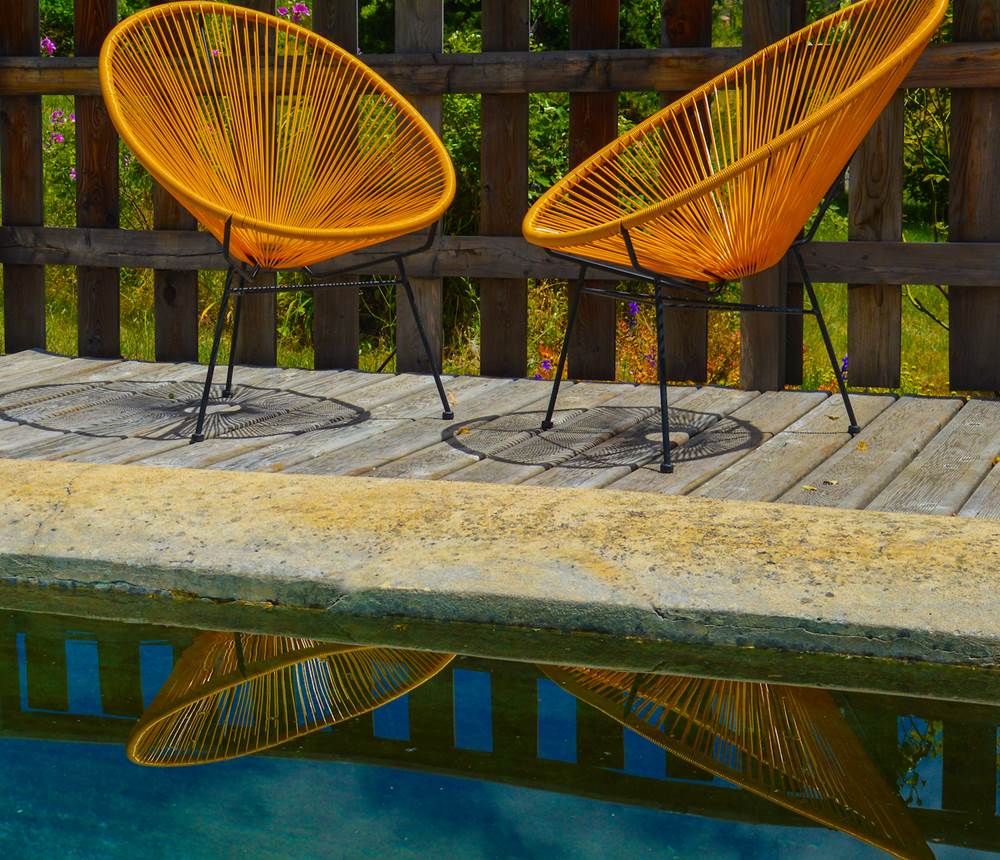 Les reflets du bassin de la Bastide du Claus