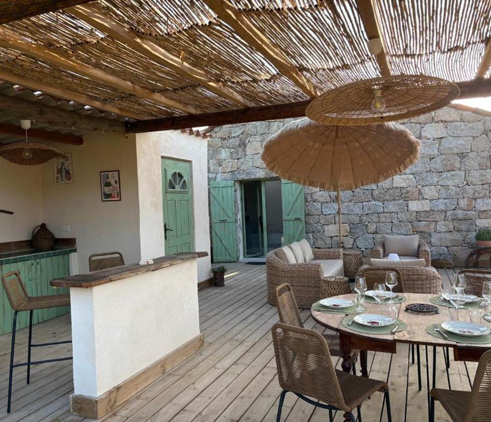 Terrasse rustique avec pergola