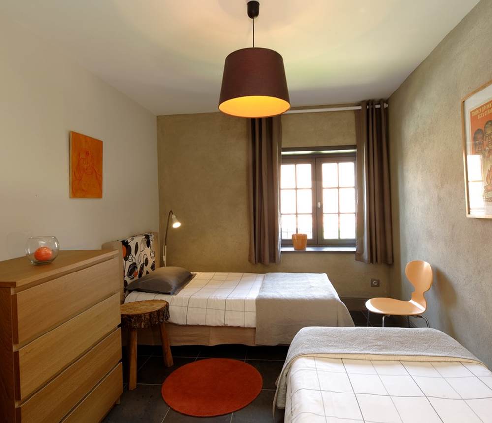 La chambre orange à l'Oustal