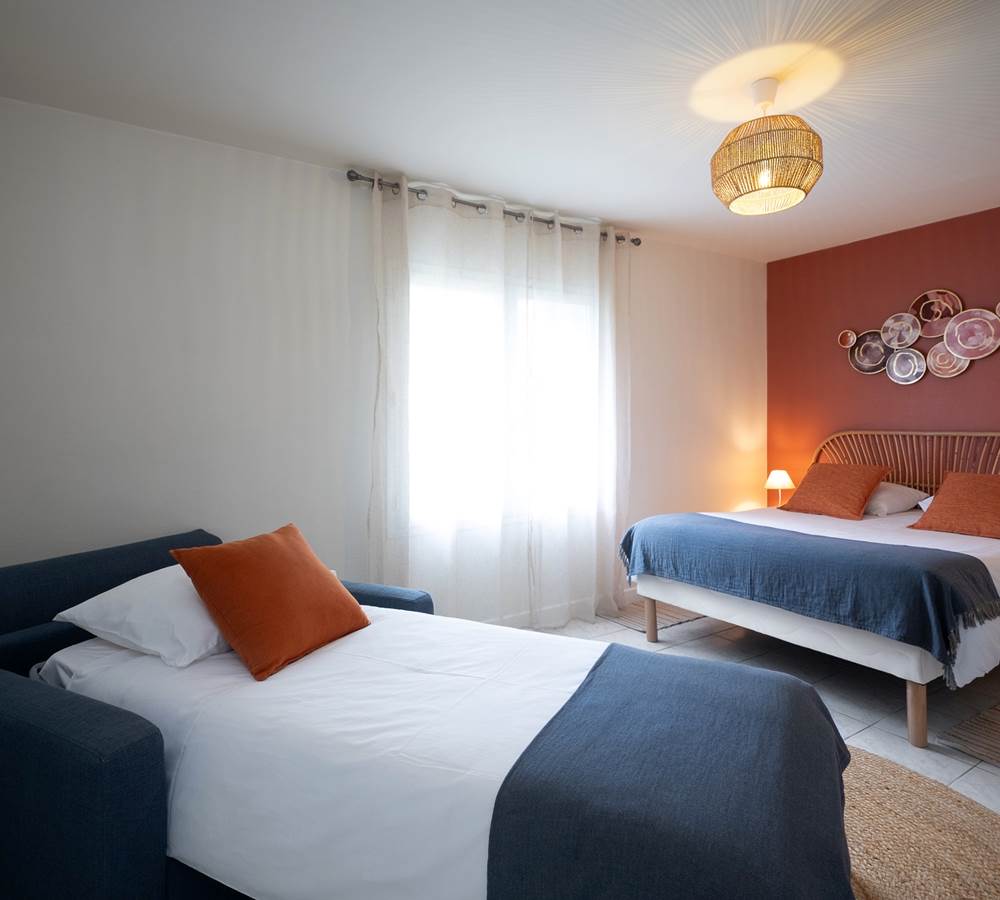 La même chambre à coucher pour 3 personnes