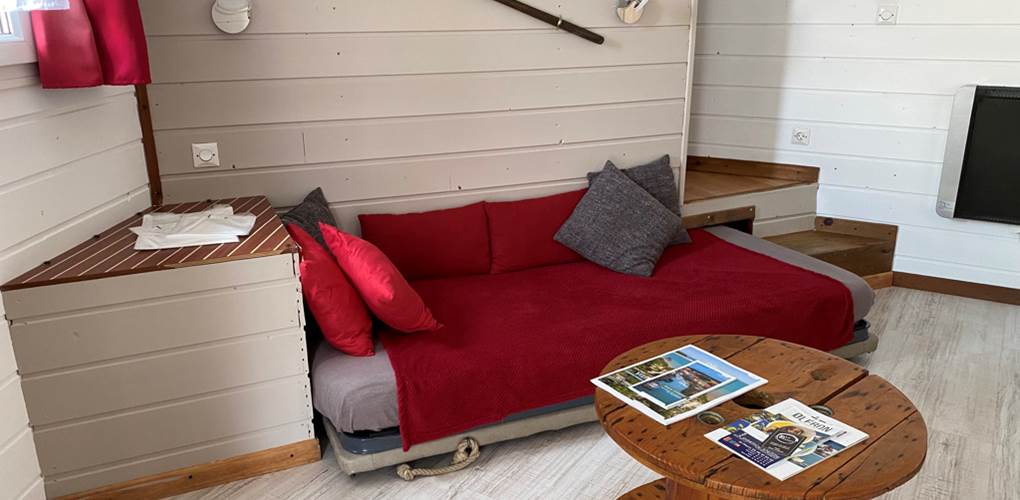 Espace salon et lit de 140cm