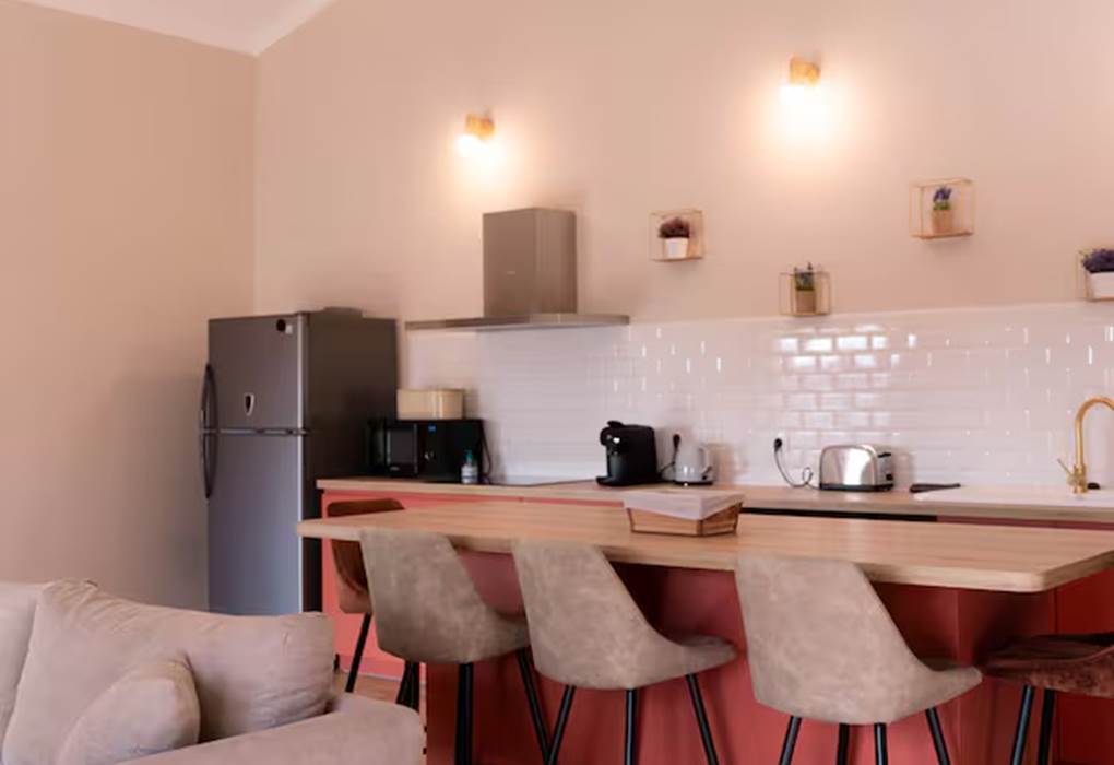 coin cuisine avec îlot Appartement La Bastide