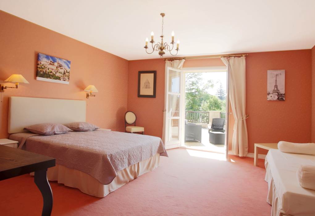 Chambre quadruple gentilhommière avec balcon ou terrasse partagée