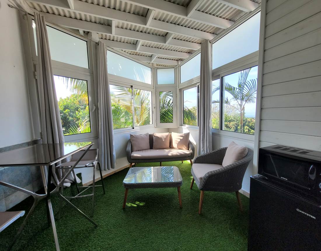 Salon - véranda de la suite