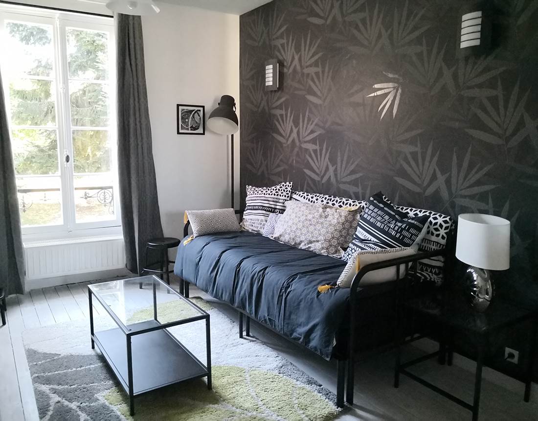 Maison Courbarien - suite "Onyx"   salon canapé