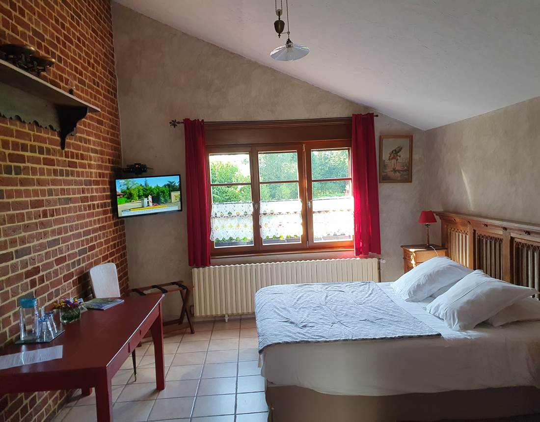 Vue sur le bocage et sur les ânes