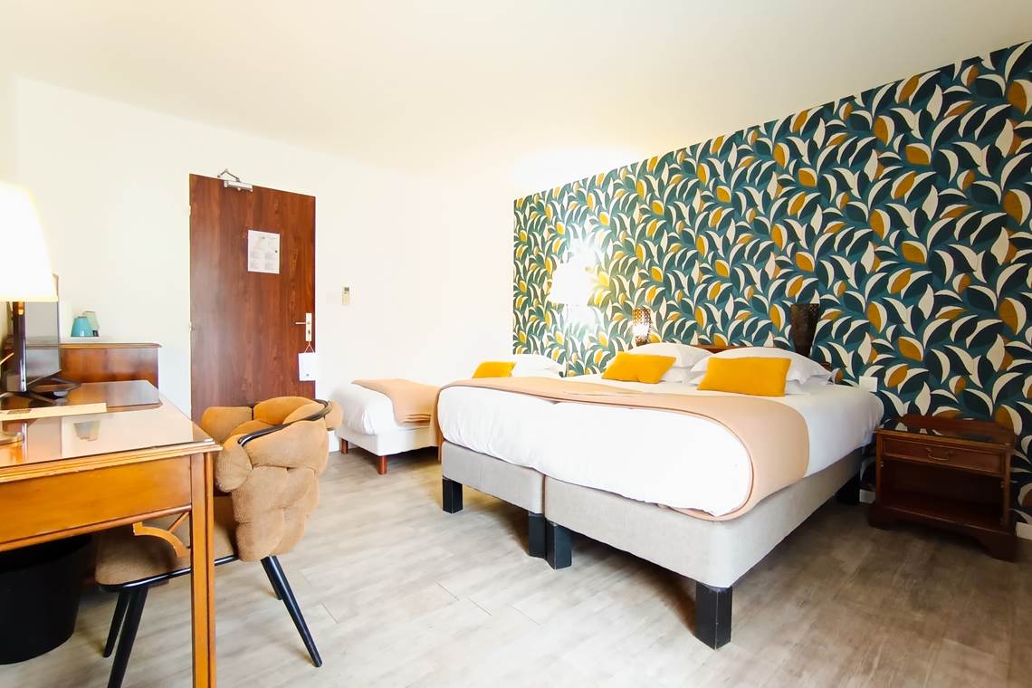 Chambre triple avec grand balcon