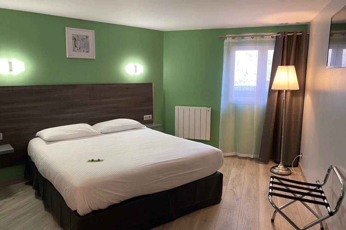 Chambre Grand lit double Confort - Vue sur Jardin