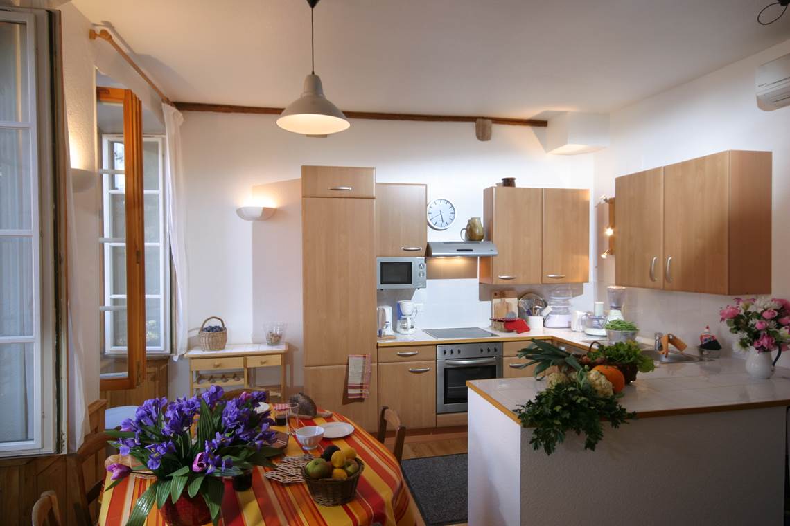 L'espace Cuisine Toute équipée avec lave-linge et sèche-linge