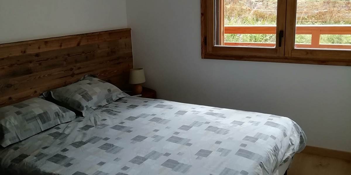 L'oxalis-70m²-n°812-appartement-Taninges-chambre-à-coucher-literie-confortable
