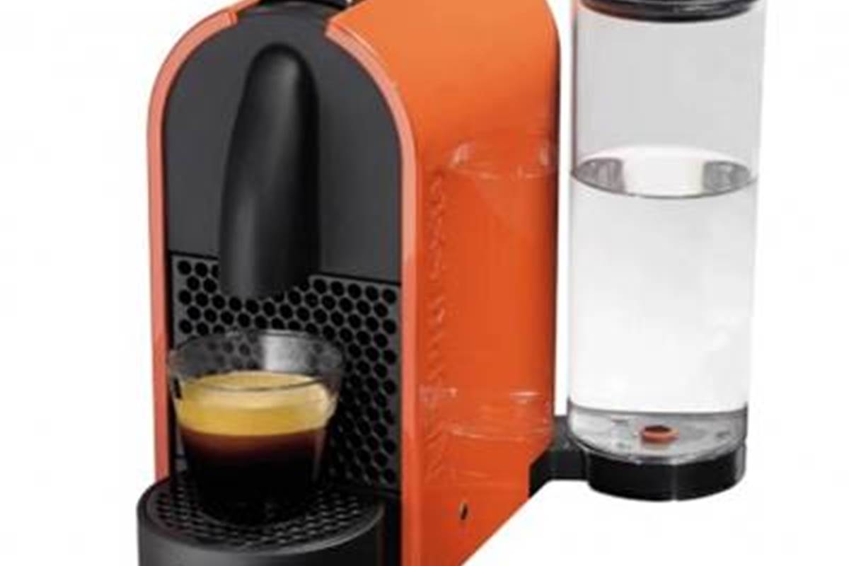 cafetière Nespresso, les cartouches sont fournies.