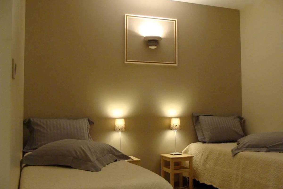 Chambre 3 lits simples