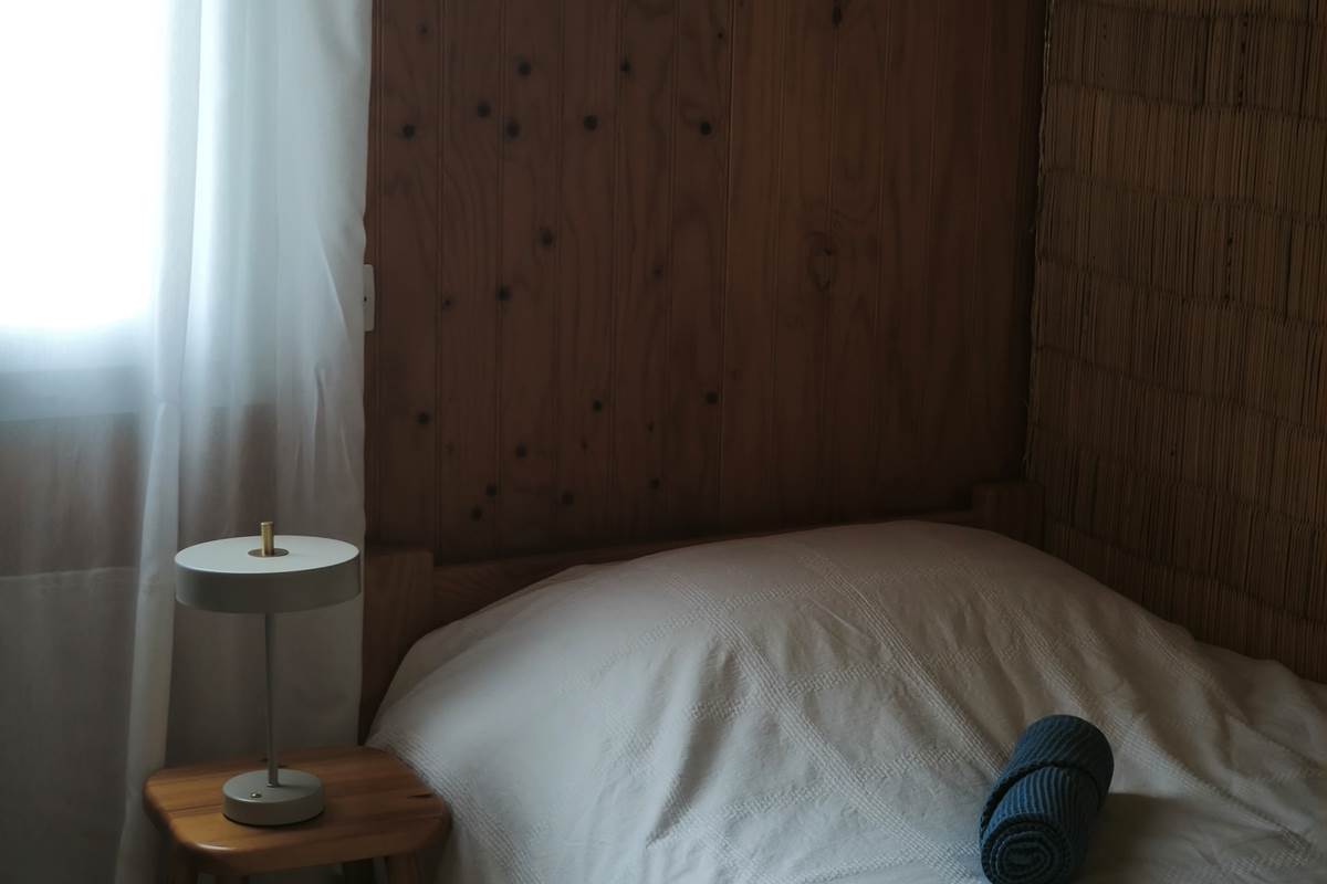 Chambre avec 3 lit simples