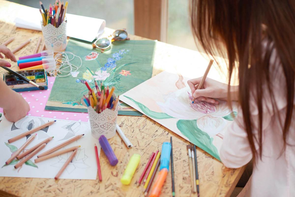 artist-painting-beautiful-flower-sheet-paper (1)