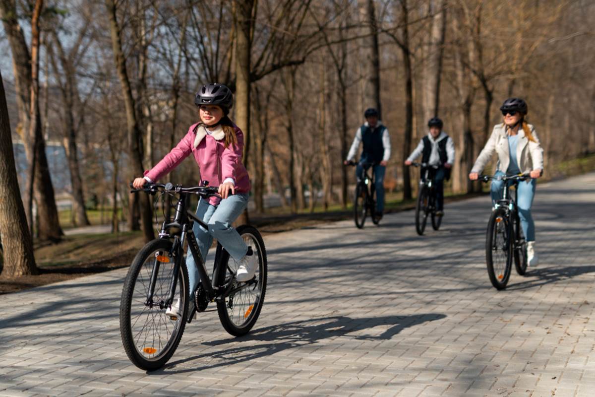 full-shot-family-cycling-together (1)