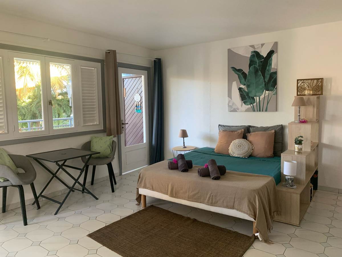 Chambre avec cuisine attenante