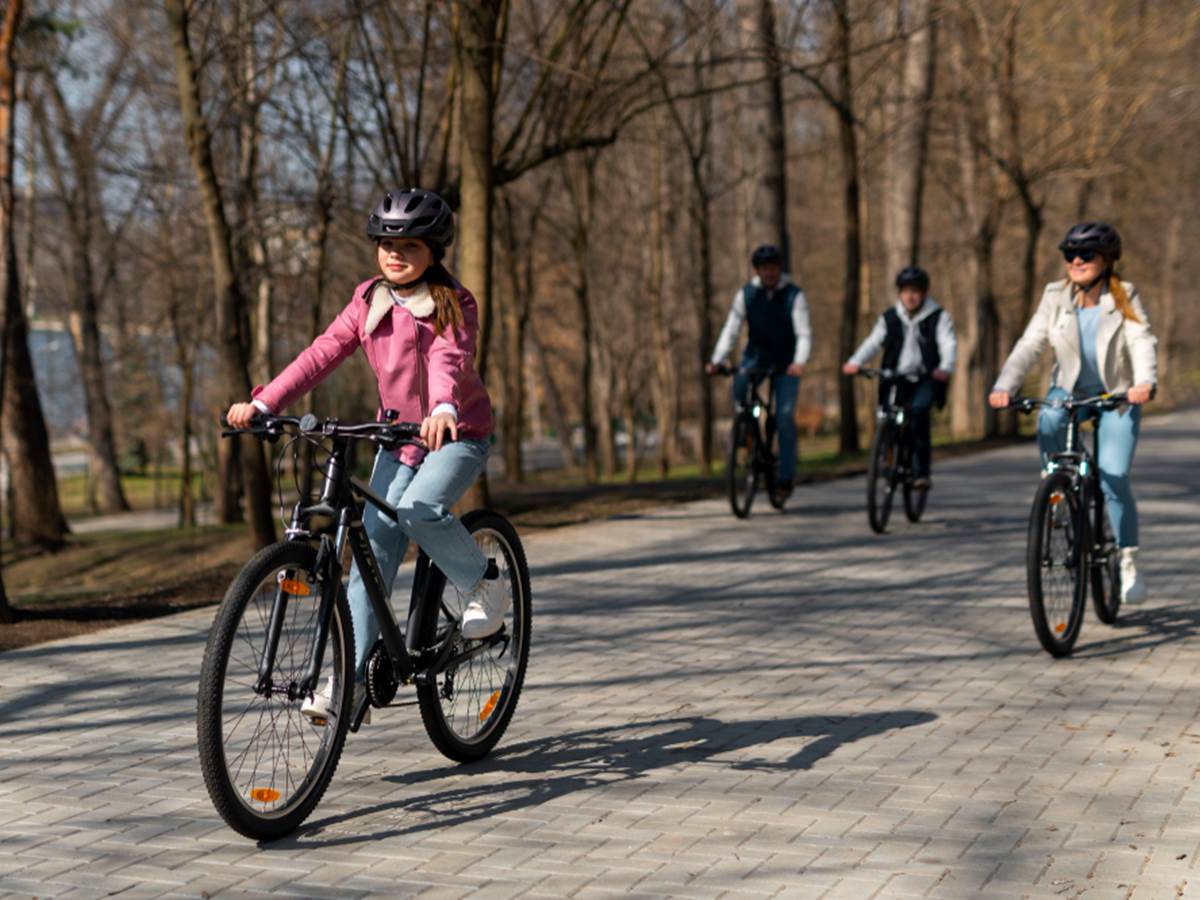 full-shot-family-cycling-together (1)-photo-gallery