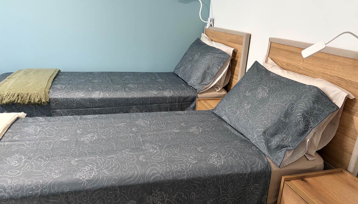 Chambre bleue lits séparés