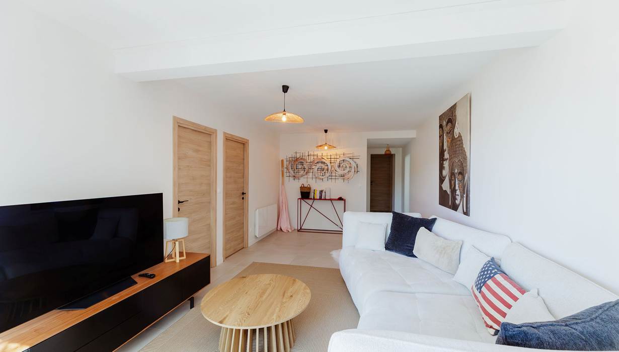 Villa La Canopée salon rez de chaussée TV