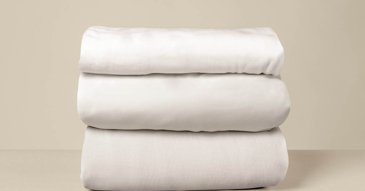 linge-lit-blanc-empile