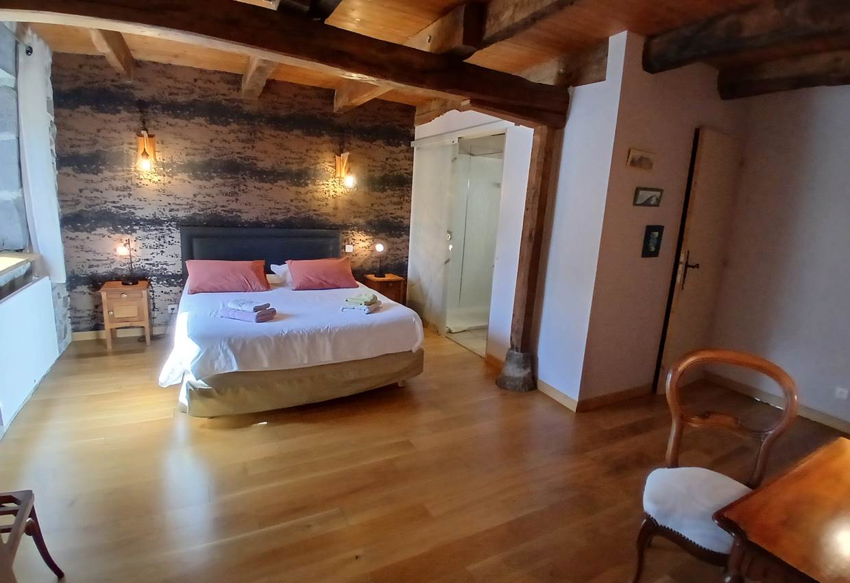 Chambre Terre — une ambiance douce et naturelle, inspirée des matières brutes et des couleurs minérales