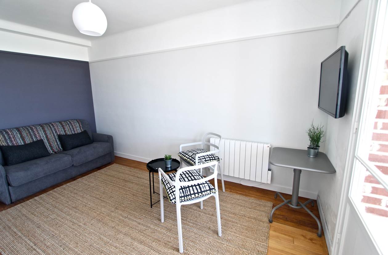 Pièce à vivre ouverte sur le balcon