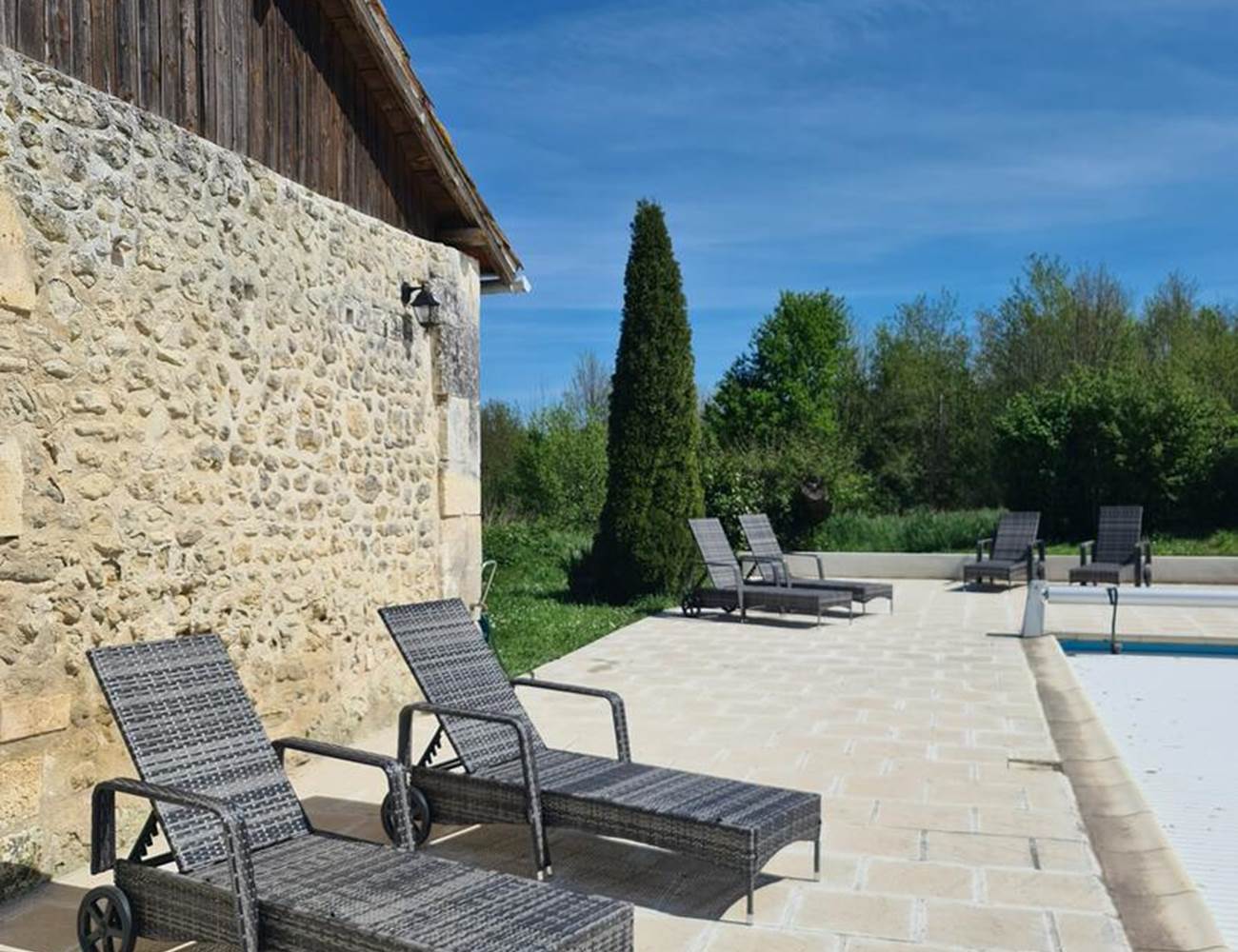 Loungers on pool terrace-photo-gallery