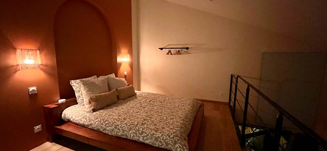 La chambre en mezzanine